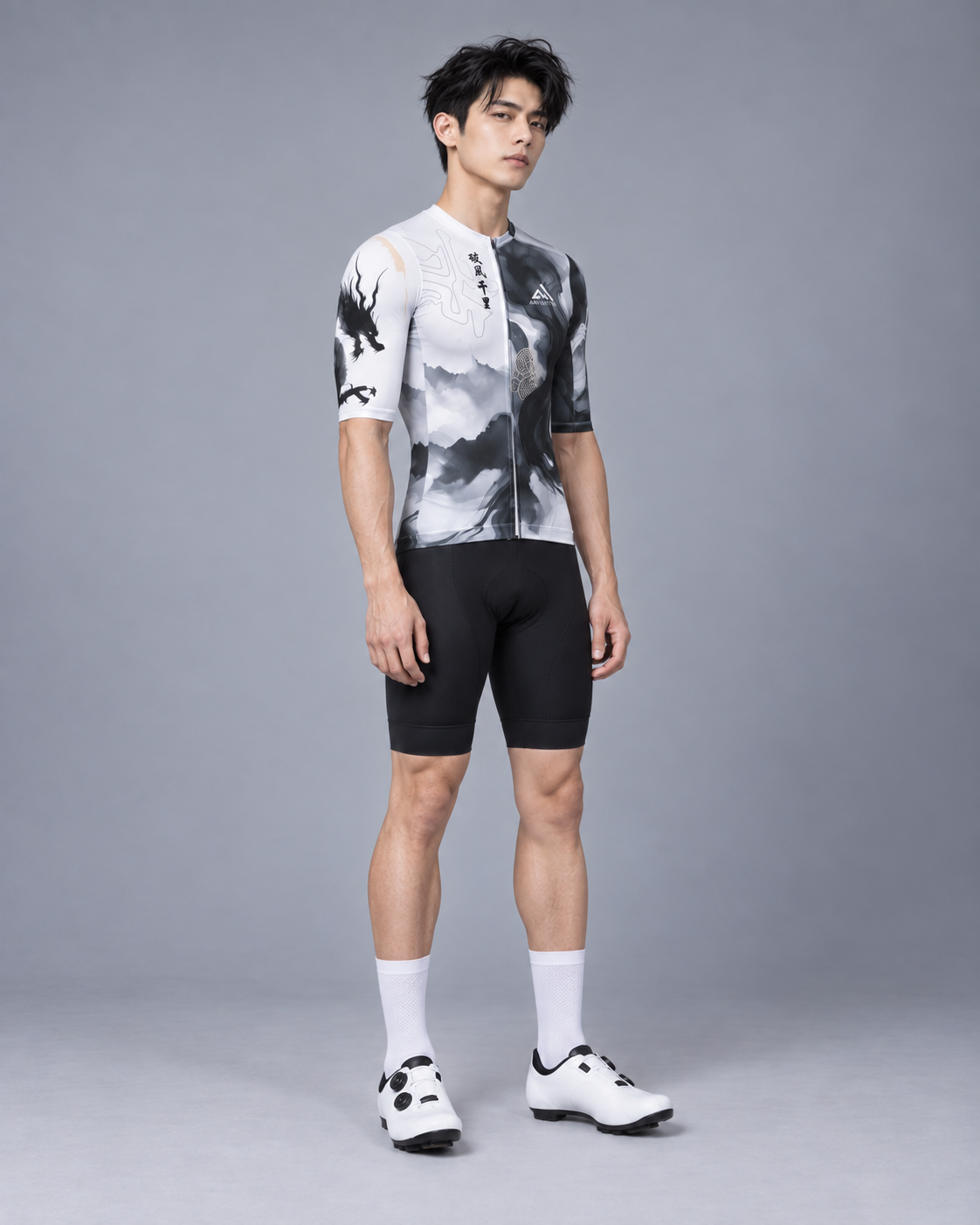 Full-body three-quarter front view of a Taiwanese male cyclist wearing the ARVENTO ink-wash cycling jersey.
