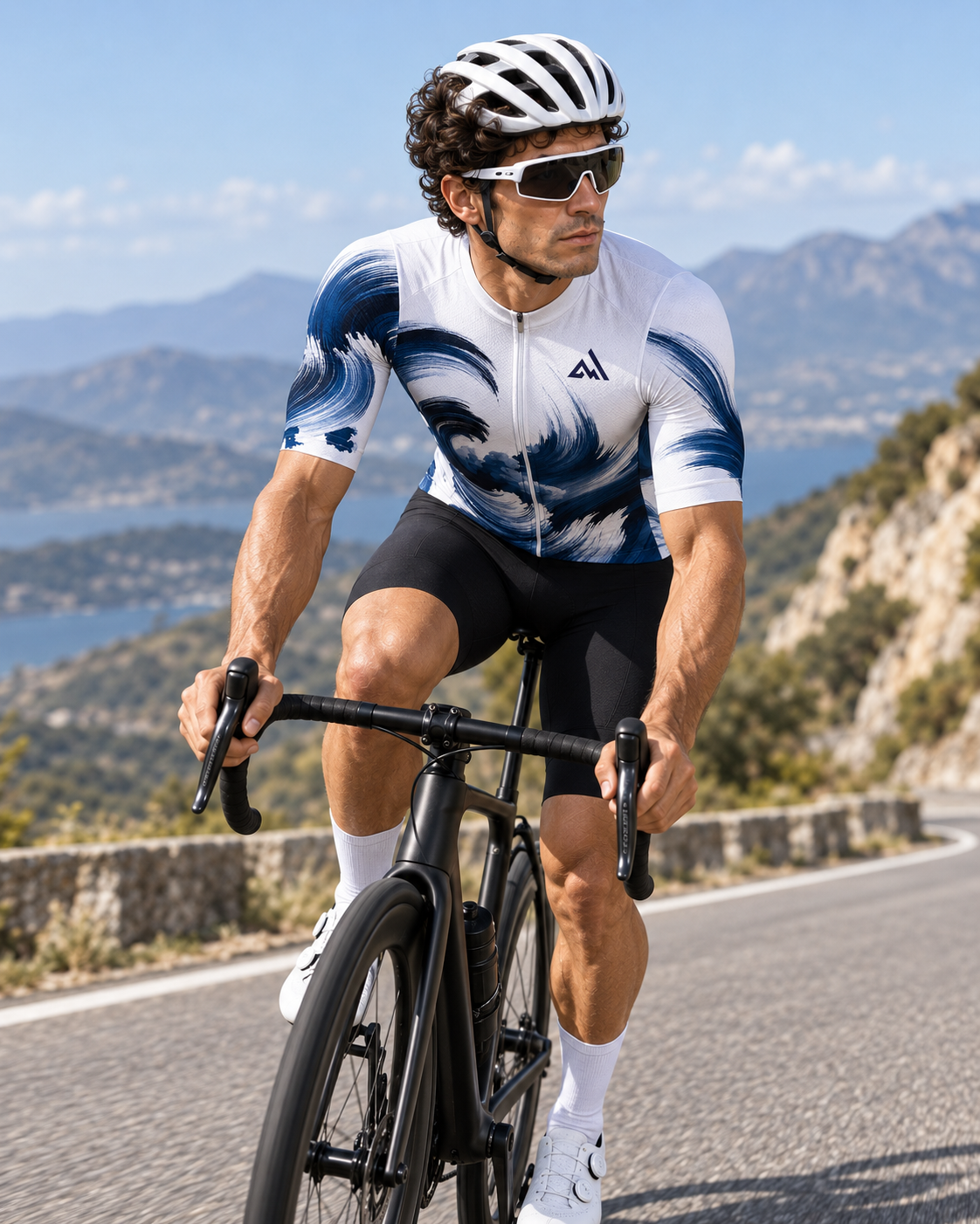 Male cyclist wearing the ARVENTO W001 Indigo Current jersey on a scenic road ride.