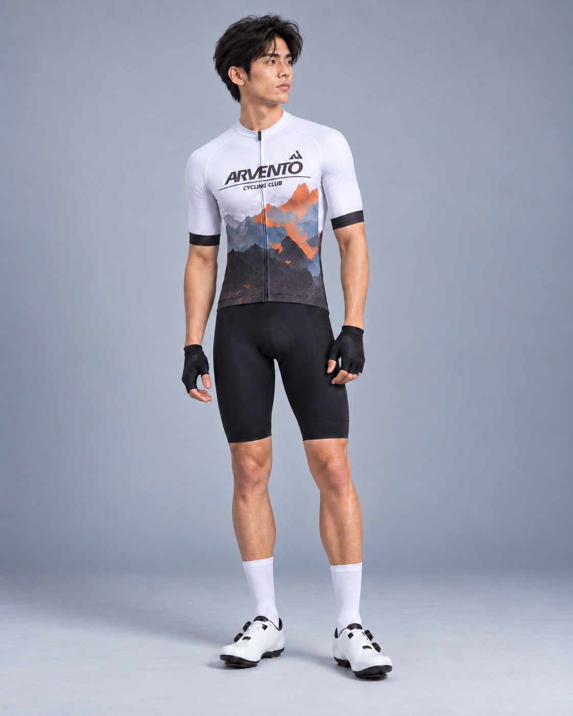 Taiwanese male cyclist wearing the ARVENTO white mountain cycling jersey in a full-body studio view.