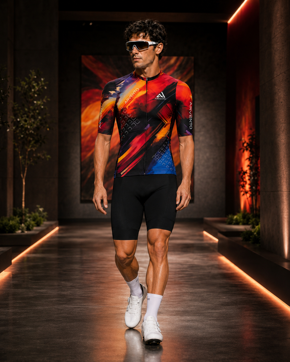 Male cyclist wearing the ARVENTO CB001 Abstract Brush cycling jersey.