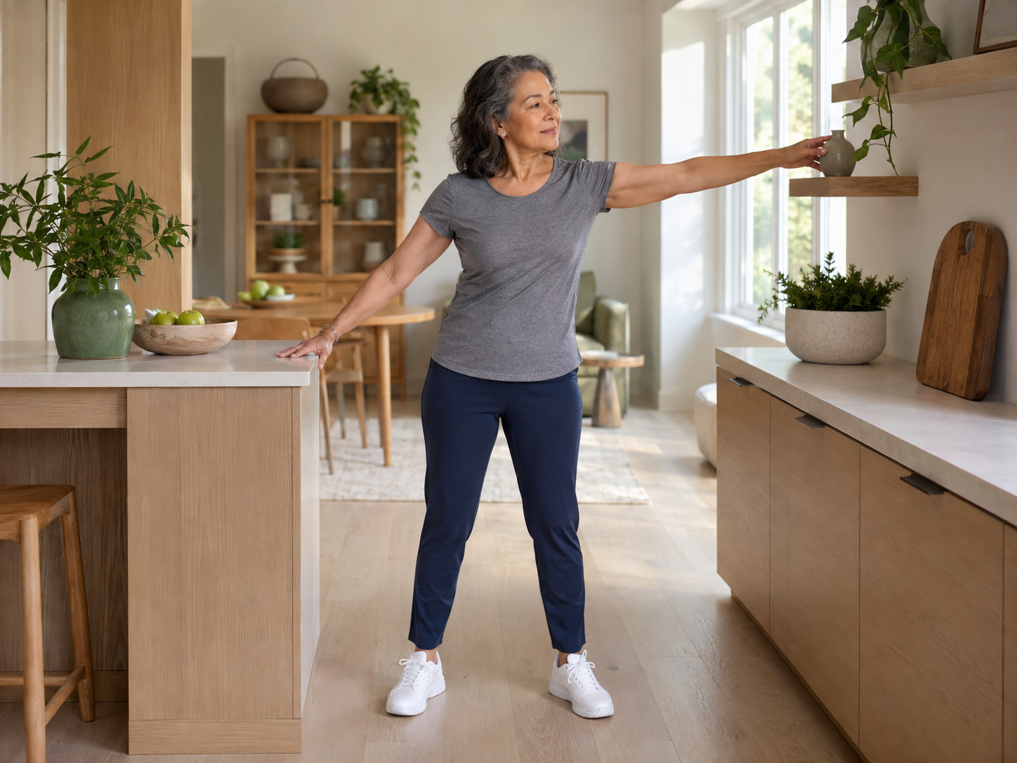 Reach across the body with a small controlled turn while support remains close.